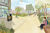 Architektur-Rendering: Menschen sitzen auf Bänken, laufen auf Wegen und arbeiten in einer Schreinerei. Im Hintergrund begrünte Häuser, Bäume und Beete.